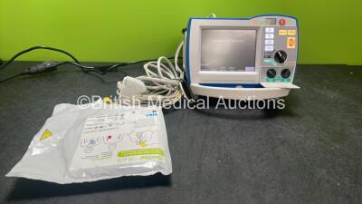 Zoll R Series Plus Defibrillator / Monitor Including Pacer, ECG and Printer Options with 1 x Zoll Sure Power II Battery, 1 x 3 Lead ECG Lead and 1 x Zoll Onestep Adult Electrode Pads *Exp 24-09-2024* (Powers Up)