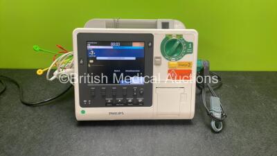 Philips Heartstart XL+ Defibrillator Including ECG and Printer Options with 1 x Paddle Lead, 1 x 3 Lead ECG Lead and 1 x Battery (Powers Up) *SN US31410905*