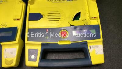 3 x Cardiac Science Powerheart AED G3 Automated External Defibrillators with 3 x Batteries (2 x Power Up, 1 x No Power, All with Damage to Casing - See Photos) - 3