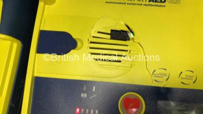 3 x Cardiac Science Powerheart AED G3 Automated External Defibrillators with 3 x Batteries (2 x Power Up, 1 x No Power, All with Damage to Casing - See Photos) - 6