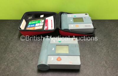 Job Lot Including 1 x Laerdal Heartstart FR Defibrillator and 1 x Heartstream FR Defibrillator with 1 x Battery, 1 x Electrode Pack *Expired* and 1 x Carry Case (Both Power Up)