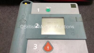 Job Lot Including 1 x Laerdal Heartstart FR Defibrillator and 1 x Heartstream FR Defibrillator with 1 x Battery, 1 x Electrode Pack *Expired* and 1 x Carry Case (Both Power Up) - 3