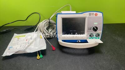 Zoll R Series Plus Defibrillator / Monitor Including Pacer, ECG and Printer Options with 1 x Zoll Sure Power II Battery, 1 x 3 Lead ECG Lead and 1 x Zoll Onestep Adult Electrode Pads *Exp 11-12-2024* (Powers Up)