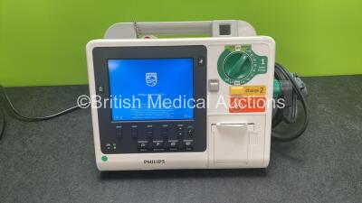 Philips Heartstart XL+ Defibrillator Including ECG and Printer Options with 1 x Paddle Lead, 1 x 3 Lead ECG Lead and 1 x Battery (Powers Up) *SN US31410923*