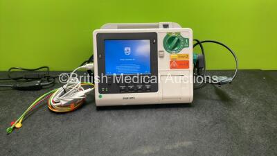 Philips Heartstart XL+ Defibrillator Including ECG and Printer Options with 1 x Paddle Lead, 1 x 3 Lead ECG Lead and 1 x Battery (Powers Up) *SN US31410925*