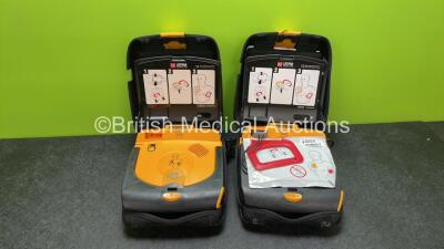 2 x Physio Control Lifepak CR Plus Defibrillators with 1 x Electrode Pads in 2 x Carry Cases (Both Power Up, 1 Battery Included is Flat)