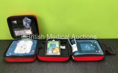 Job Lot Including 1 x Philips Heartstart HS1 Defibrillator with 1 x Battery *Install Date 2025* and 1 x Electrode Pack *Expired 2022* and 1 x Philips Heartstart FRx Defibrillator with 1 x Battery *Install Date 2025* and 1 x Electrode Pack *Expires 08-2023