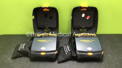 2 x Physio Control Lifepak CR Plus Defibrillators *Mfd 2016 / 2015* with 2 x Electrode Pads *Both in Date* and 2 x Res-Cue Masks in 2 x Carry Cases (Both Power Up)