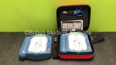 2 x Philips Heartstart HS1 Defibrillators with 2 x Electrodes Pads *Both Expired 05/2023* 2 x Batteries *Install Dates 2027 / 2027* and 1 x Carry Case (Both Power Up)