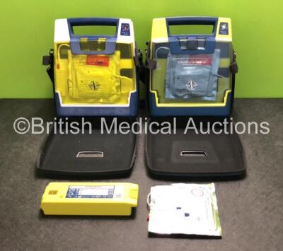 2 x Cardiac Science Powerheart AED G3 Automated External Defibrillators with 2 x Batteries and 3 x Electrodes Pads *All Expired* in Carry Cases (Both Power Up with Low Battery)