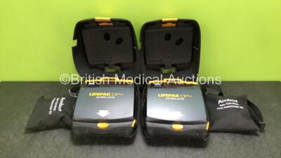 2 x Physio Control Lifepak CR Plus Defibrillators *Mfd 2015 / 2015* with 2 x Electrode Pads *Both in Date* and 2 x Res-Cue Masks in 2 x Carry Cases (Both Power Up)