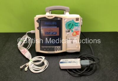 Philips Heartstart MRx Defibrillator Including Pacer, ECG and Printer Options with 1 x ECG Lead, 1 x Paddle Lead, 1 x M3539A Module, 1 x M3538A Battery and 1 x Philips M3725A Test Load (Powers Up with Alarm)