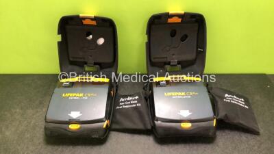 2 x Physio Control Lifepak CR Plus Defibrillators *Mfd 2016 / 2016* with 2 x Electrode Pads *Both in Date* and 2 x Res-Cue Masks in 2 x Carry Cases (Both Power Up)