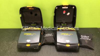 2 x Physio Control Lifepak CR Plus Defibrillators *Mfd 2016 / 2016* with 2 x Electrode Pads *Both in Date* and 2 x Res-Cue Masks in 2 x Carry Cases (Both Power Up)