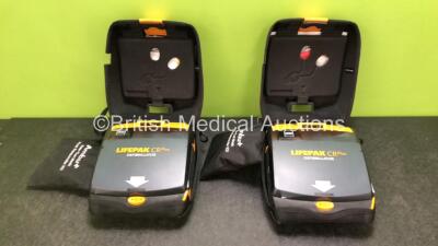 2 x Physio Control Lifepak CR Plus Defibrillators *Mfd 2016 / 2016* with 2 x Electrode Pads *Both in Date* and 2 x Res-Cue Masks in 2 x Carry Cases (Both Power Up)