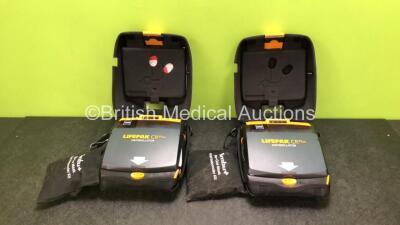 2 x Physio Control Lifepak CR Plus Defibrillators *Mfd 2016 / 2016* with 2 x Electrode Pads *Both in Date* and 2 x Res-Cue Masks in 2 x Carry Cases (Both Power Up)