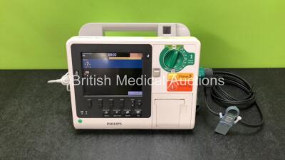 Philips Heartstart XL+ Defibrillator Including ECG and Printer Options with 1 x ECG Lead, 1 x Paddle Lead and 1 x Battery (Powers Up) *SN US31410962*