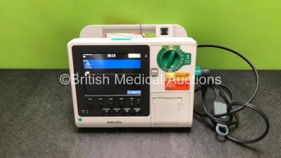 Philips Heartstart XL+ Defibrillator Including ECG and Printer Options with 1 x Paddle Lead and 1 x Battery (Powers Up) *SN US31410932*