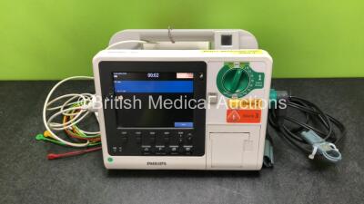 Philips Heartstart XL+ Defibrillator Including ECG and Printer Options with 1 x ECG Lead, 1 x Paddle Lead and 1 x Battery (Powers Up) *SN US31410929*