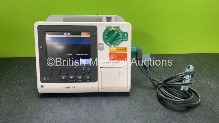 Philips Heartstart XL+ Defibrillator Including ECG and Printer Options with 1 x Paddle Lead and 1 x Battery (Powers Up) *SN US31410909*