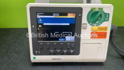 Philips Heartstart XL+ Defibrillator Including ECG and Printer Options with 1 x Paddle Lead and 1 x Battery (Powers Up) *SN US31410909* - 2