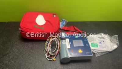 Laerdal Heartstart FR2+Defibrillator with 1 x 3 Lead ECG Lead, 1 x Philips M3863A Battery *Install Date 11-2024* 2 x Electrode Pads *Exp 01-2023* in Carry Case (Powers Up and Passes Self Test) *SN 0207225806*