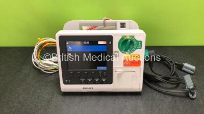 Philips Heartstart XL+ Defibrillator Including ECG and Printer Options with 1 x ECG Lead, 1 x Paddle Lead and 1 x Battery (Powers Up) *SN US31410906*