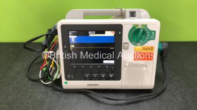 Philips Heartstart XL+ Defibrillator Including ECG and Printer Options with 1 x ECG Lead, 1 x Paddle Lead and 1 x Battery (Powers Up) *SN US31410911*