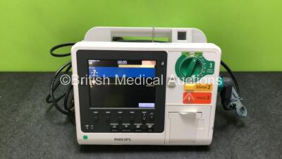 Philips Heartstart XL+ Defibrillator Including ECG and Printer Options with 1 x Paddle Lead and 1 x Battery (Powers Up) *SN US31410973*