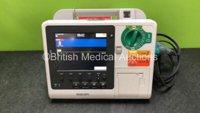 Philips Heartstart XL+ Defibrillator Including ECG and Printer Options with 1 x Paddle Lead and 1 x Battery (Powers Up) *SN US31410928*