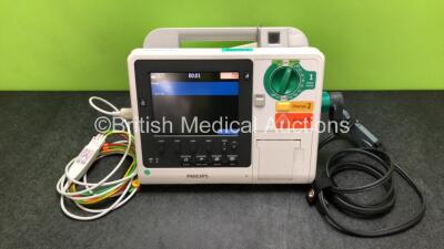 Philips Heartstart XL+ Defibrillator Including ECG and Printer Options with 1 x ECG Lead, 1 x Paddle Lead and 1 x Battery (Powers Up) *SN US31410983*