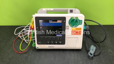 Philips Heartstart XL+ Defibrillator Including Pacer, ECG and Printer Options with 1 x ECG Lead, 1 x Paddle Lead and 1 x Battery (Powers Up) *SN US31410821*