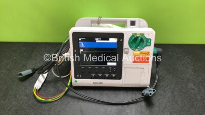 Philips Heartstart XL+ Defibrillator Including ECG and Printer Options with 1 x ECG Lead, 1 x Paddle Lead and 1 x Battery (Powers Up) *SN US31410943*