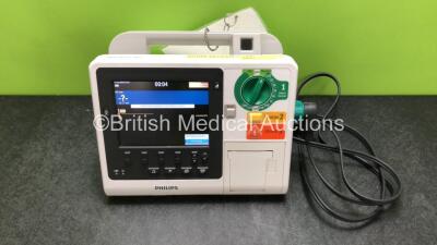 Philips Heartstart XL+ Defibrillator Including ECG and Printer Options with 1 x Paddle Lead and 1 x Battery (Powers Up) *SN US31410954*