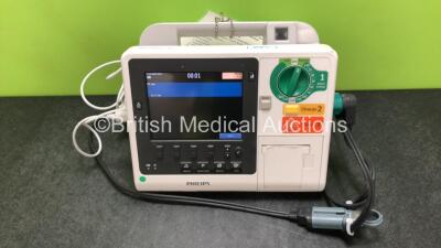 Philips Heartstart XL+ Defibrillator Including ECG and Printer Options with 1 x ECG Lead, 1 x Paddle Lead and 1 x Battery (Powers Up) *SN US31410917*