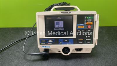 Medtronic Lifepak 20 Defibrillator / Monitor Including Pacer, ECG and Printer Options with 1 x 3 Lead ECG Lead (Powers Up with Service Light-See Photo)