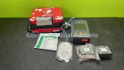 Philips Heartstart FR3 Defibrillator with 2 x Batteries *Install Dates 03-2022, 12-2020* 1 x Electrode in Carry Cases (Powers Up)