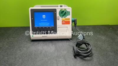 Philips Heartstart XL+ Defibrillator Including ECG and Printer Options with 1 x Paddle Lead, and 1 x Battery (Powers Up) *SN US31410935*