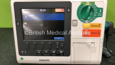 Philips Heartstart XL+ Defibrillator Including ECG and Printer Options with 1 x Paddle Lead and 1 x Battery (Powers Up) *SN US31410981* - 2