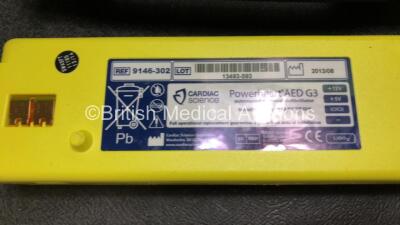 2 x Cardiac Science Powerheart AED G3 Automated External Defibrillators with 4 x Batteries (Both Power Up, 1 x Requires Service) - 5