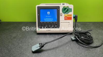 Philips Heartstart XL+ Defibrillator Including ECG and Printer Options with 1 x Paddle Lead and 1 x Battery (Powers Up) *SN US31410982*