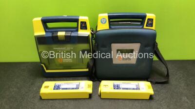 2 x Cardiac Science Powerheart AED G3 Automated External Defibrillators with 4 x Batteries and 1 x Carry Case (Both Power Up)