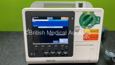 Philips Heartstart XL+ Defibrillator Including ECG and Printer Options with 1 x Paddle Lead and 1 x Battery (Powers Up) *SN US31410963* - 2