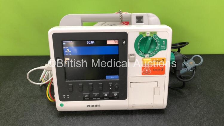 Philips Heartstart XL+ Defibrillator Including ECG and Printer Options with 1 x ECG Lead, 1 x Paddle Lead and 1 x Battery (Powers Up) *SN US31410946*