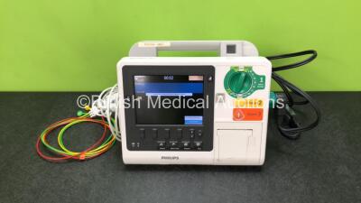 Philips Heartstart XL+ Defibrillator Including Pacer, ECG and Printer Options with 1 x ECG Lead, 1 x Paddle Lead and 1 x Battery (Powers Up) *SN US31410823*