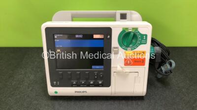 Philips Heartstart XL+ Defibrillator Including ECG and Printer Options with 1 x Paddle Lead and 1 x Battery (Powers Up) *SN US31410979*