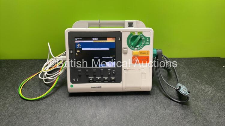 Philips Heartstart XL+ Defibrillator Including ECG and Printer Options with 1 x Paddle Lead, 1 x 3 Lead ECG Lead and 1 x Battery (Powers Up) *SN US31410937*