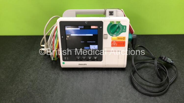 Philips Heartstart XL+ Defibrillator Including ECG and Printer Options with 1 x ECG Lead, 1 x Paddle Lead and 1 x Battery (Powers Up) *SN US31410920*