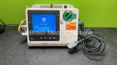 Philips Heartstart XL+ Defibrillator Including ECG and Printer Options with 1 x Paddle Lead, 1 x 3 Lead ECG Lead and 1 x Battery (Powers Up) *SN US31410933*