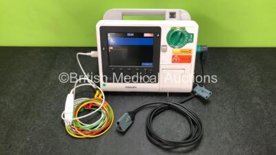 Philips Heartstart XL+ Defibrillator Including ECG and Printer Options with 1 x ECG Lead, 1 x Paddle Lead and 1 x Battery (Powers Up) *SN US31410913*